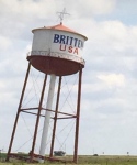 Photograph of a tilted water tower
